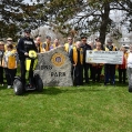 Members of the Belleville Lions Club and the Belleville Police Service surround Constable Mark Hall 